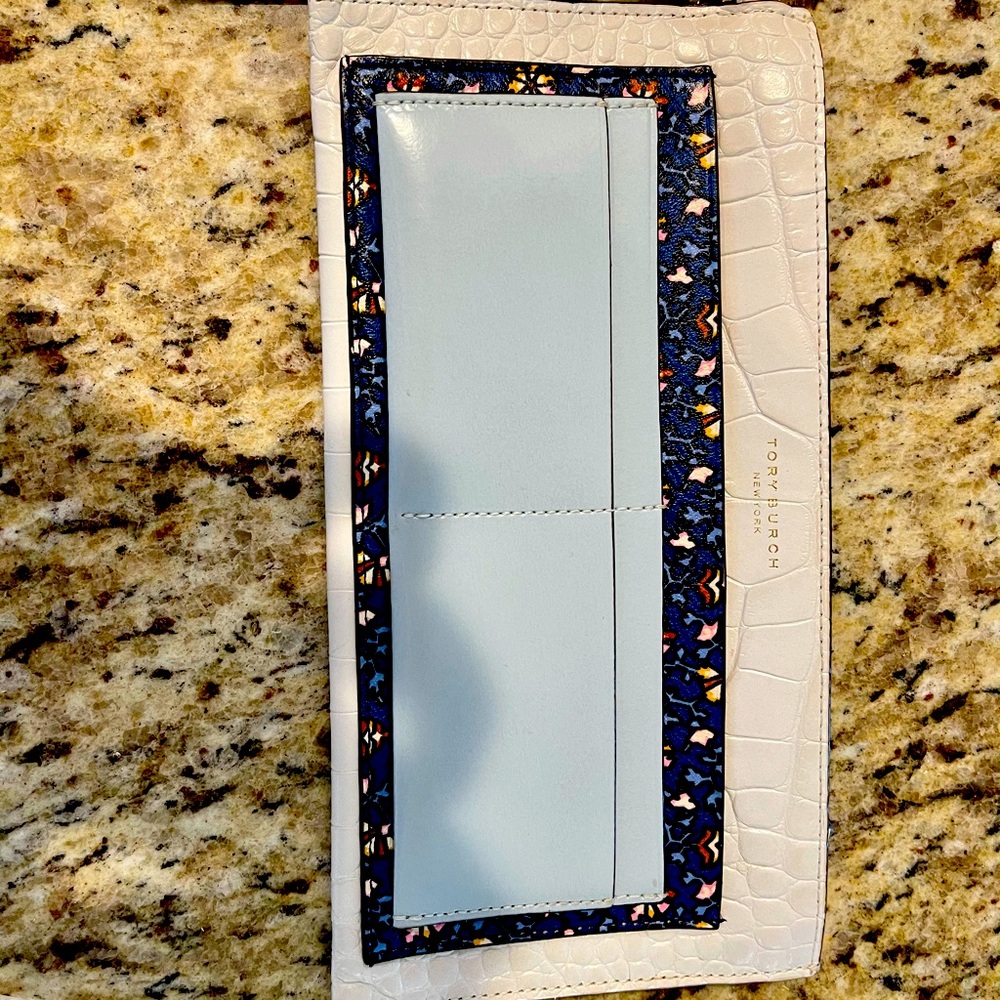 Tory Burch long zip wallet/clutch with tassel.